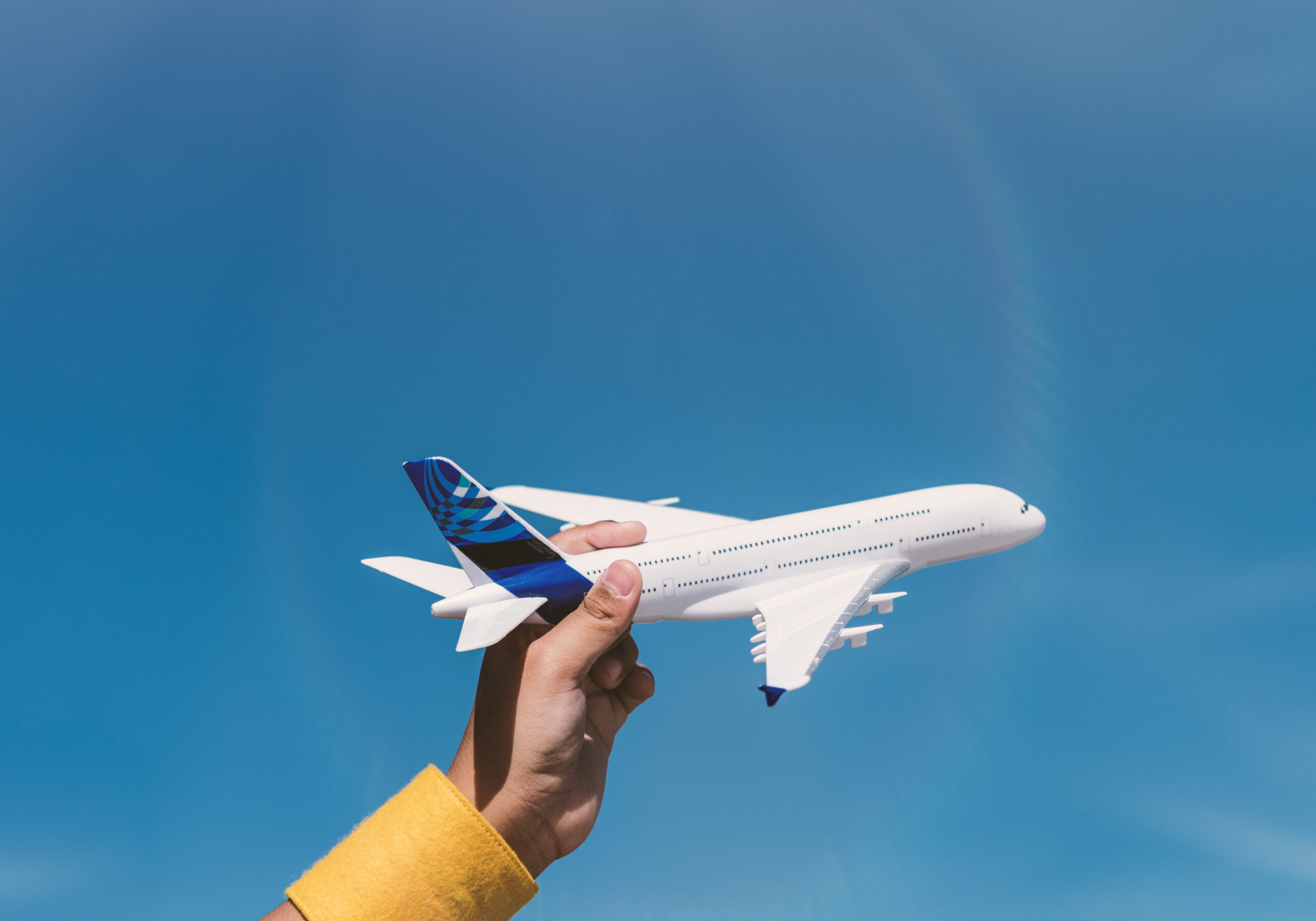 Kid playing with a toy airplane